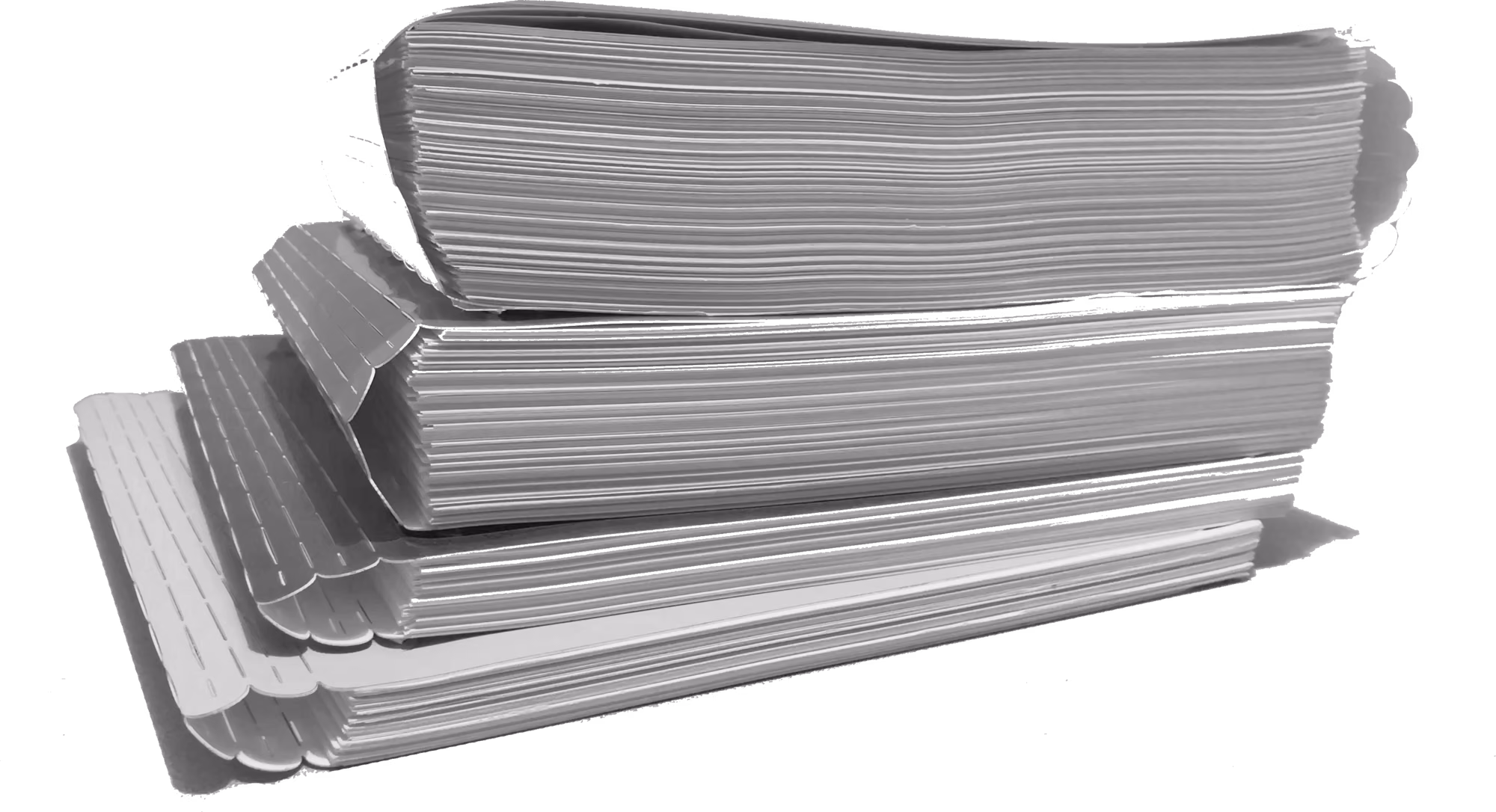 A stack of four ringless binders, each stuffed with paper.